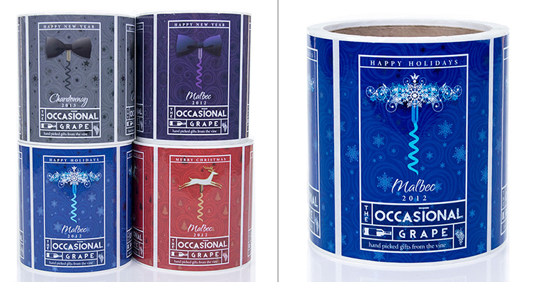 Rolls of custom wine labels with holiday label designs for Christmas and New Years.