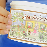 Hand applying a label